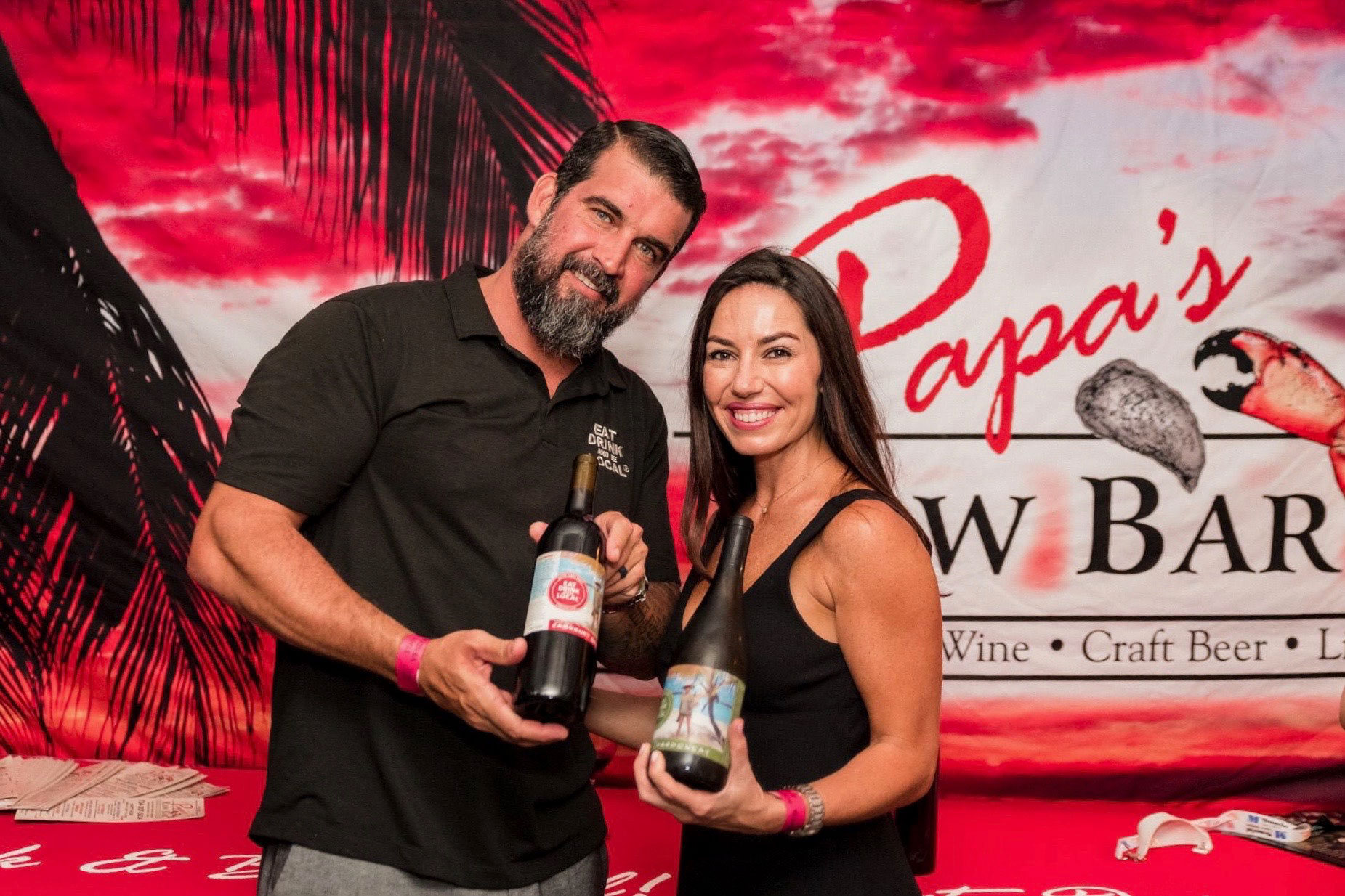 Troy Ganter of Papa's Raw Bar with his wife Cassie