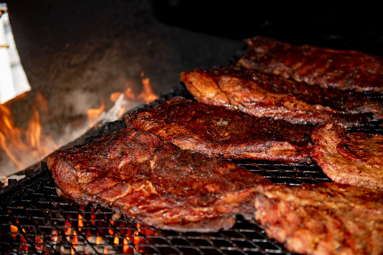 Ribs on the smoker at Troy's BBQ in Boynton Beach