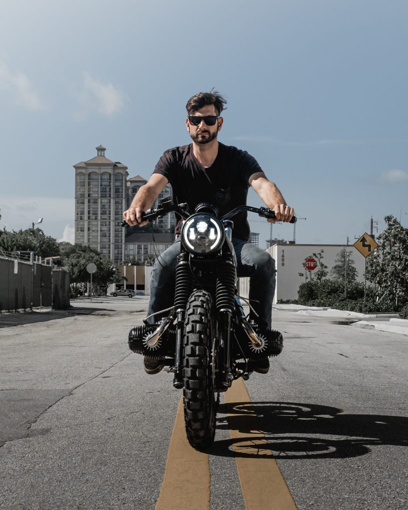 David Plotkin Riding Vintage Motorcycle