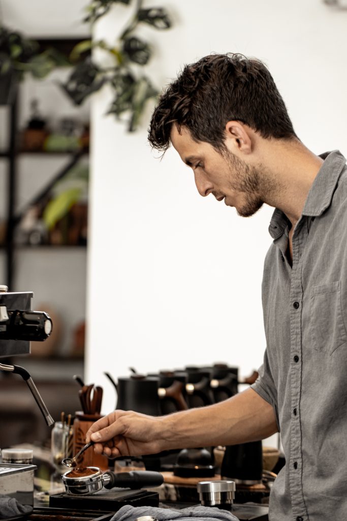 Joshua Korman Making Espresso Coffee at the Composition Coffee House