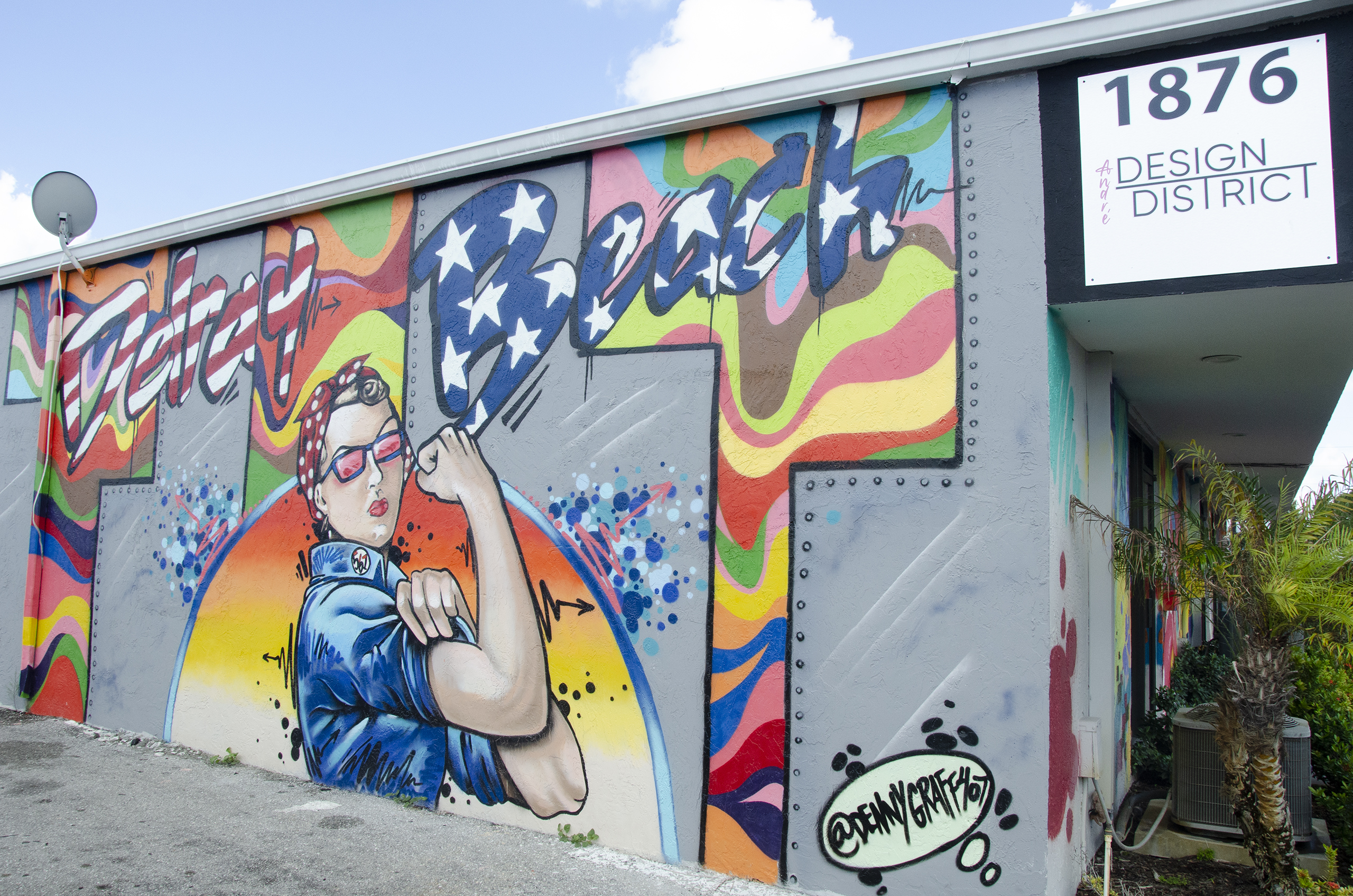Mural at Andre Design District in Delray Beach. The mural is a rendition of Rose the Riveter.