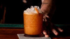 Tony's Marsala maragarita, an orange drink in a rocks glass. from Juicy Cocktail Bar in West Palm Beach.