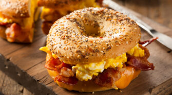 Close up of a bacon, egg and cheese sandwich on an everything bagel. For Bagels in Boca Raton feature.