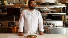 Portrait photos of Chef Pushkar Marathe of Stage Kitchen in Palm Beach Gardens. Chef Marathe is inside his kitchen, standing at the counter.