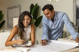 Rebeca and Jonathan Llampay look over materials.