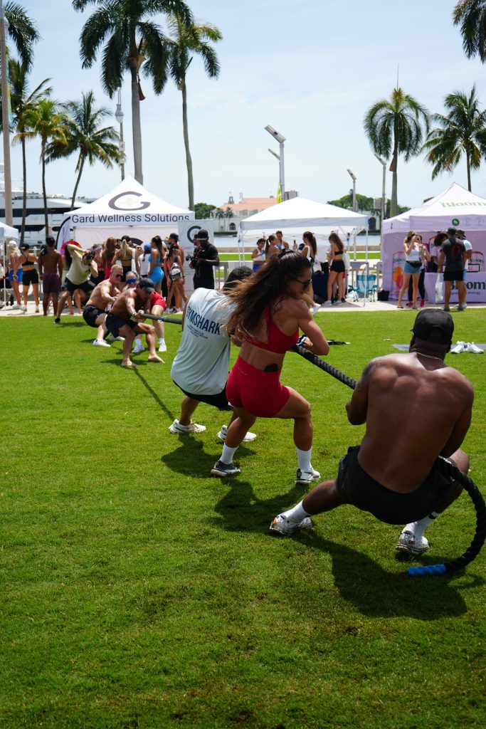 A group from The Cold Collective participates in a game of tug-of-war.