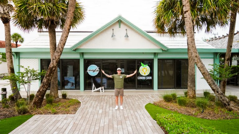 Golden Juicery Owner Ethan Jaudus stands in front of new location