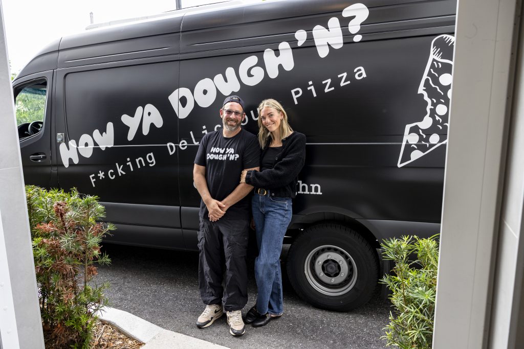 Garett and Gabby Goodman in front  of How Ya Dough'n truck 