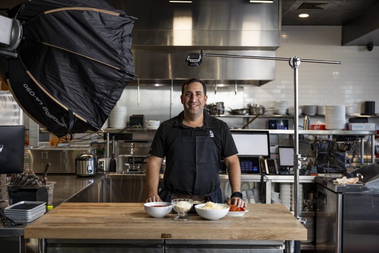 Chef Koby Wexler in front of his setup he uses to create his social media videos.